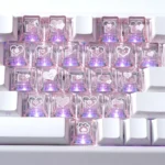 Detailed shot of romantic heart butterfly Supplement Keycap Set, showcasing their translucent design and delicate shimmering motifs, glowing beautifully with backlight design.