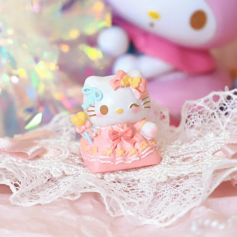 Close-up views of the vibrant Hello Kitty artisan resin keycap, showcasing its whimsical design and intricate details from various angles, perfect for fans.