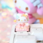 Close-up of a vibrant Hello Kitty artisan resin keycap for ESC, showcasing its intricate detail and whimsical charm from multiple angles.