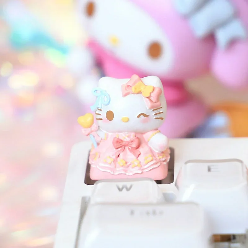 Close-up of a vibrant Hello Kitty artisan resin keycap for ESC, showcasing its intricate detail and whimsical charm from multiple angles.