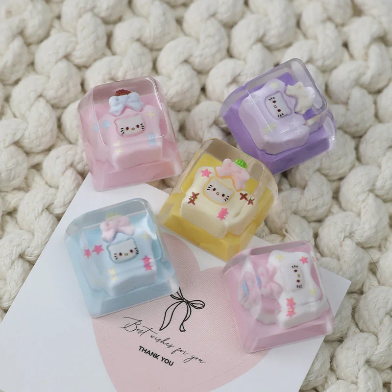 Detailed view of an exclusive Hello Kitty Star Bottle artisan resin ESC keycap, showcasing its dreamy pastel colors and sparkling star design from various angle.