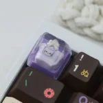 Exclusive Hello Kitty Star Bottle artisan resin ESC keycap, showcasing its dreamy pastel design with sparkling details from a unique angle.