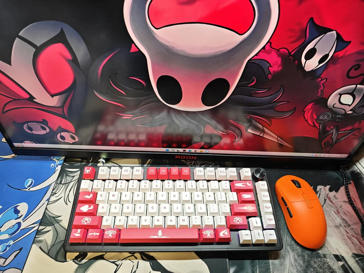 Hollow Knight The Knight PBT keycap set artfully displayed from various angles, highlighting its soulful, minimalist dark fantasy design and exclusive Cherry profile.