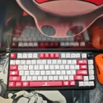 Artistic close-ups of the exclusive Hollow Knight 'The Knight' PBT keycap set, showcasing its dark fantasy, minimalist design and Cherry profile from various angles.