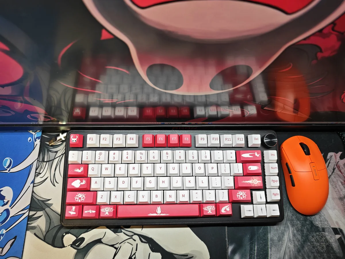 Artistic close-ups of the exclusive Hollow Knight 'The Knight' PBT keycap set, showcasing its dark fantasy, minimalist design and Cherry profile from various angles.