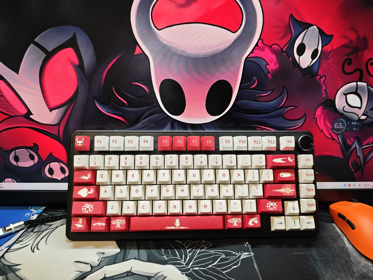 Exclusive Hollow Knight The Knight PBT keycap set, capturing the iconic hero's melancholic essence in a striking dark fantasy art style.