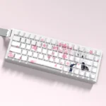 A collection of Hyouka Eru Chitanda side-print PBT shine-through keycaps shown from various angles, highlighting the detailed anime art.