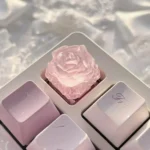 Ethereal Ice Rose Translucent Keycap, showcasing its frosted glow and delicate ice rose design from a unique angle, capturing its mystical garden aesthetics.
