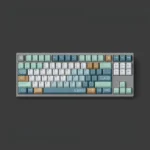 Angled view of the Inception PBT keycaps set, showcasing intricate, multi-layered architectural designs. These durable PBT keycaps evoke dreamscape design.