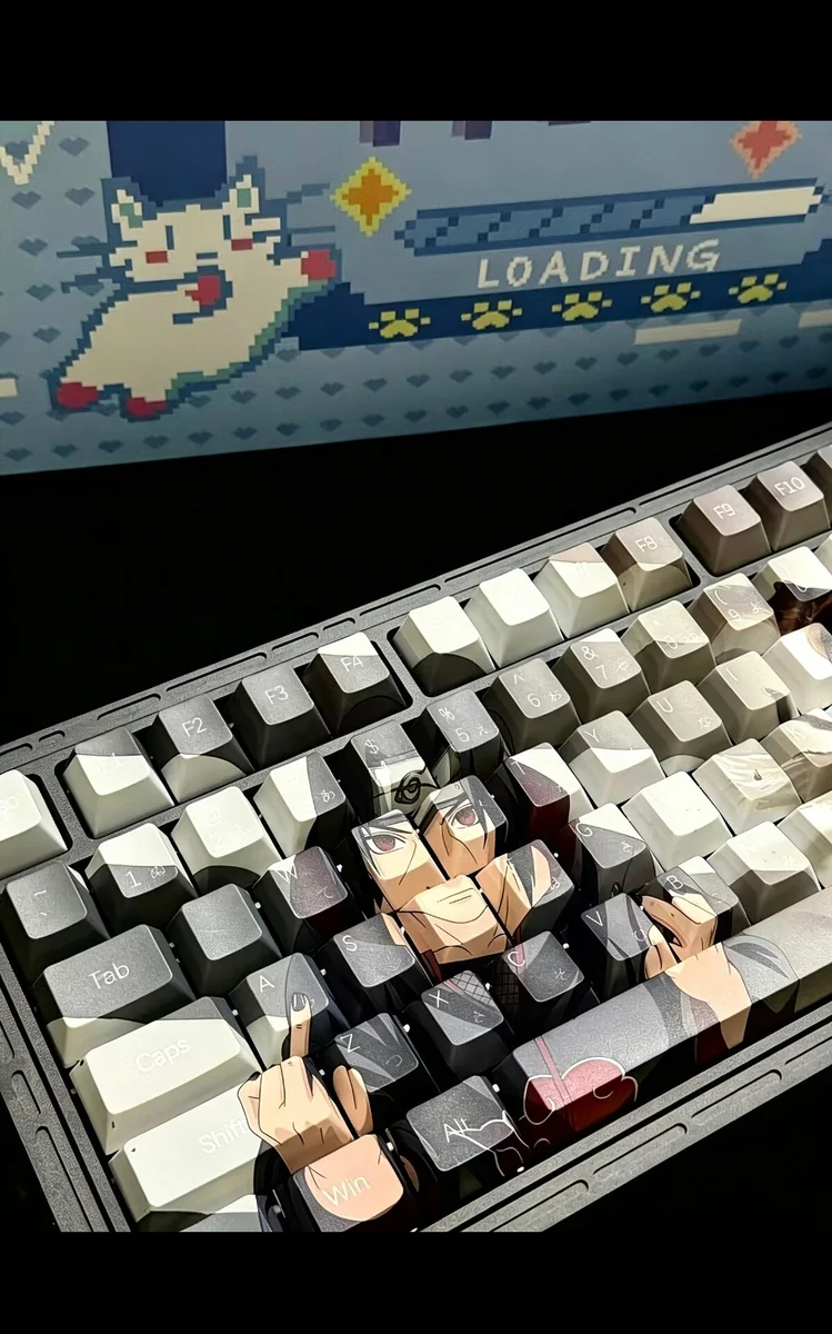 Premium PBT Itachi Uchiha dye-sub keycap set, displaying iconic dark aesthetics inspired by Naruto from various angles. High-quality for fans.