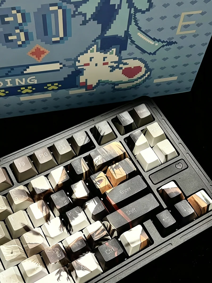Premium Itachi Uchiha PBT Dye-Sub keycap set for Naruto fans, showcasing multiple keycaps from various angles with iconic dark aesthetics.