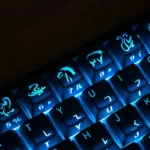 Close-up of vibrant Jackie Chan Talisman PBT keycaps set, showcasing the exclusive cartoon-inspired symbols from different angles, perfect for reliving angle.