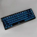 A playful gallery view of the vibrant Jackie Chan Talisman PBT keycaps set, showing various iconic symbols from Jackie Chan Adventures at different angle.