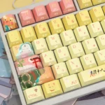 A close-up view of the Kaguya Celestial Anime PBT keycap set, highlighting the translucent material and elegant side-printed legends from a unique anime setup.