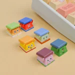 Close-up of the iconic SpongeBob Mr. Krabs peeking artisan keycap, showcasing its vibrant details and playful cartoon style from a side angle.