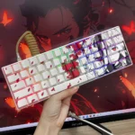 Mystical Kitsune side-lit PBT keycaps, showcasing the vibrant gradient Japanese fox mask and striking red eyes, captured with artistic detail.