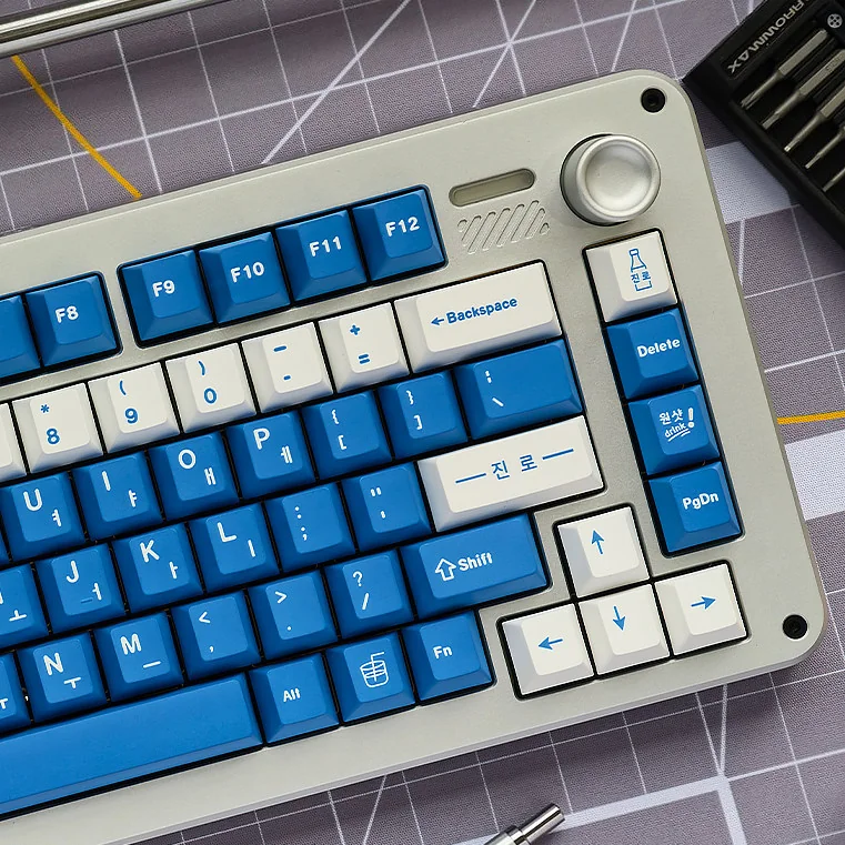 Soju Korean PBT keycaps set in vibrant hues, featuring Korean legends, displayed from various angles for a unique nostalgic desk aesthetic.