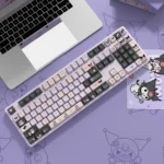 Mischievous Kuromi PBT keycaps set for custom keyboards, shown from a playful angle. Vibrant character designs highlight this premium set.