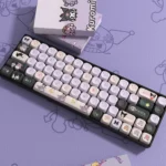 Playful Kuromi PBT keycap set for custom keyboards, featuring detailed mischievous character designs in vibrant from multiple angles.