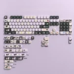 A playful Mischievous Kuromi PBT keycap set for custom keyboards, featuring vibrant characters on 141 MOC keys, perfect for a fun setup.