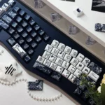 Exquisite Lace PBT Dye-Sub Keycap Set, close-up on intricate patterns. Delicate lace design conveys vintage elegance and refined sophistication.