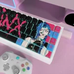 Close-up of the iconic Jinx League of Legends PBT dye-sub keycaps set, revealing vibrant, chaotic character art from a playful angle.