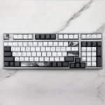 Serene Lotus PBT Dye-sub Keycap Set, showcasing tranquil PBT keycaps with elegant, subtle lotus flower designs. Artistic keyboard upgrade.