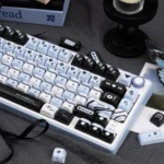 Love Prohibition PBT keycaps set: a vibrant set viewed from a dynamic angle, highlighting durable PBT and playful designs.