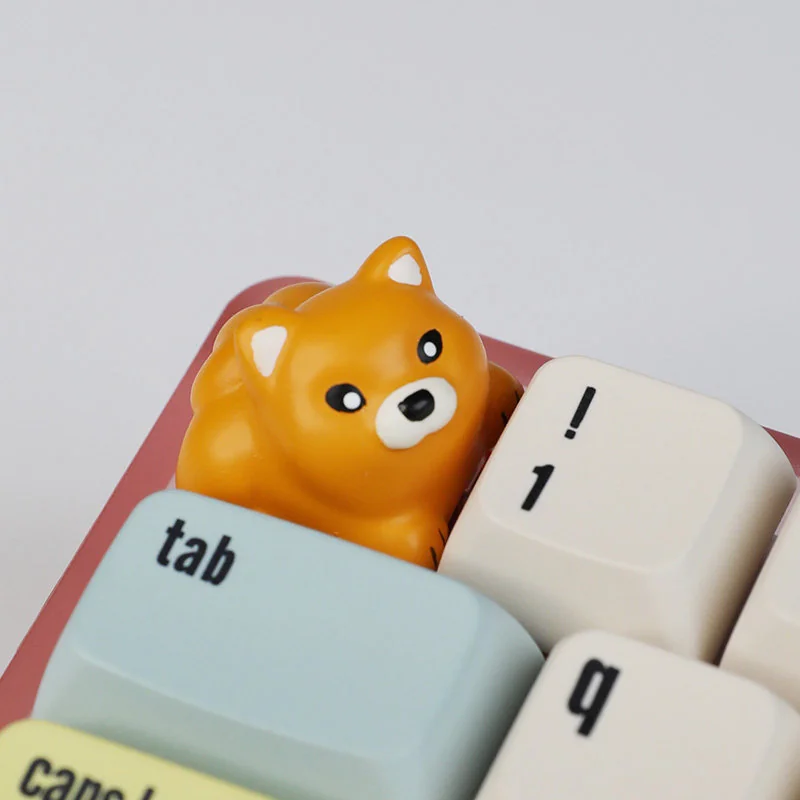 Adorable 3D Shiba Inu resin artisan keycap, a charming and vibrant handcrafted sculpture that adds playful personality to any keyboard.