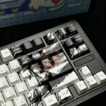 Vibrant One Piece Luffy PBT keycap set close-up, showcasing iconic character art and dynamic design for an epic typing adventure.