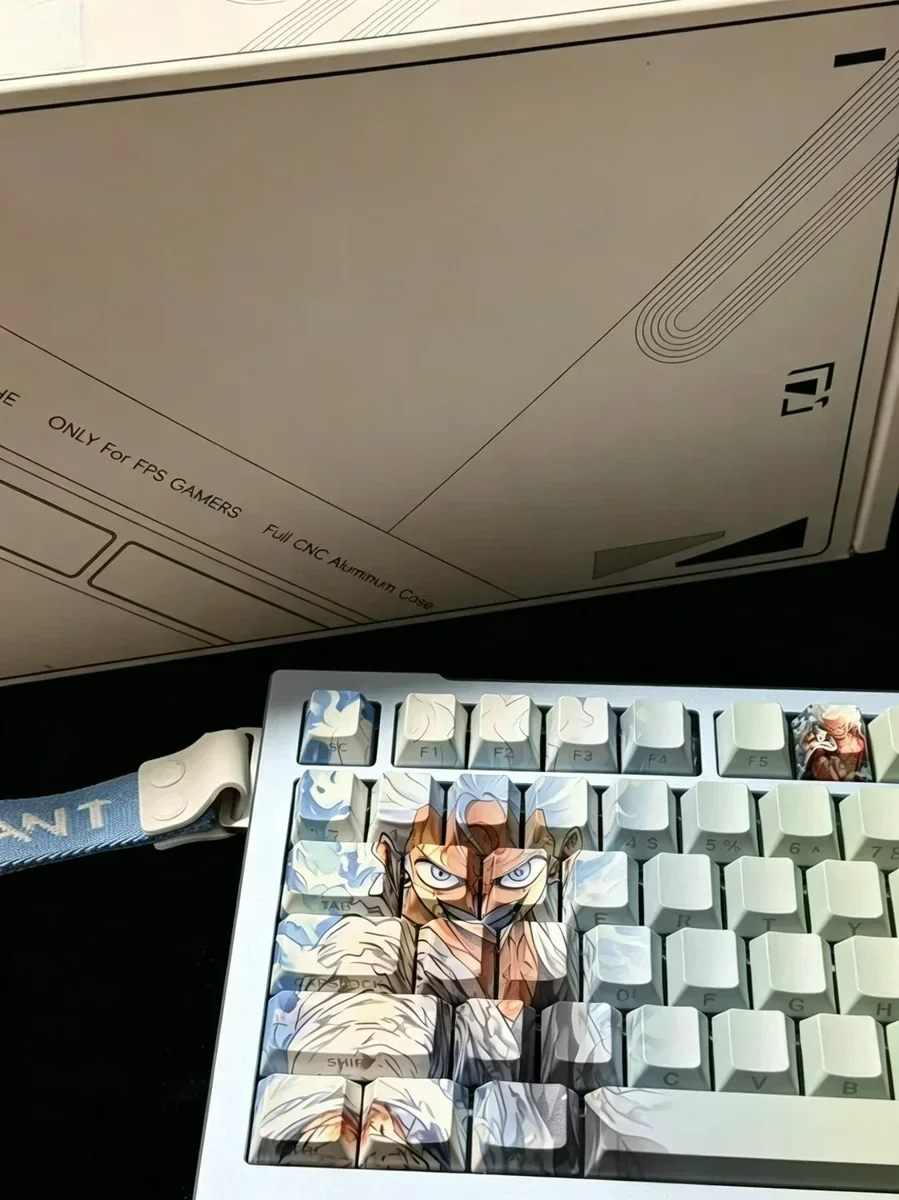 Vibrant Luffy PBT keycaps set, showcasing different angles of the One Piece side-engraved, light-transmitting legends and dynamic character art.