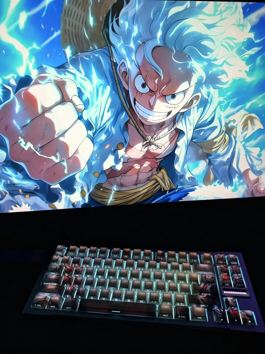 Luffy PBT keycaps Set: Side-engraved One Piece art from multiple playful angles. Light-transmitting legends glow, highlighting dynamic details.