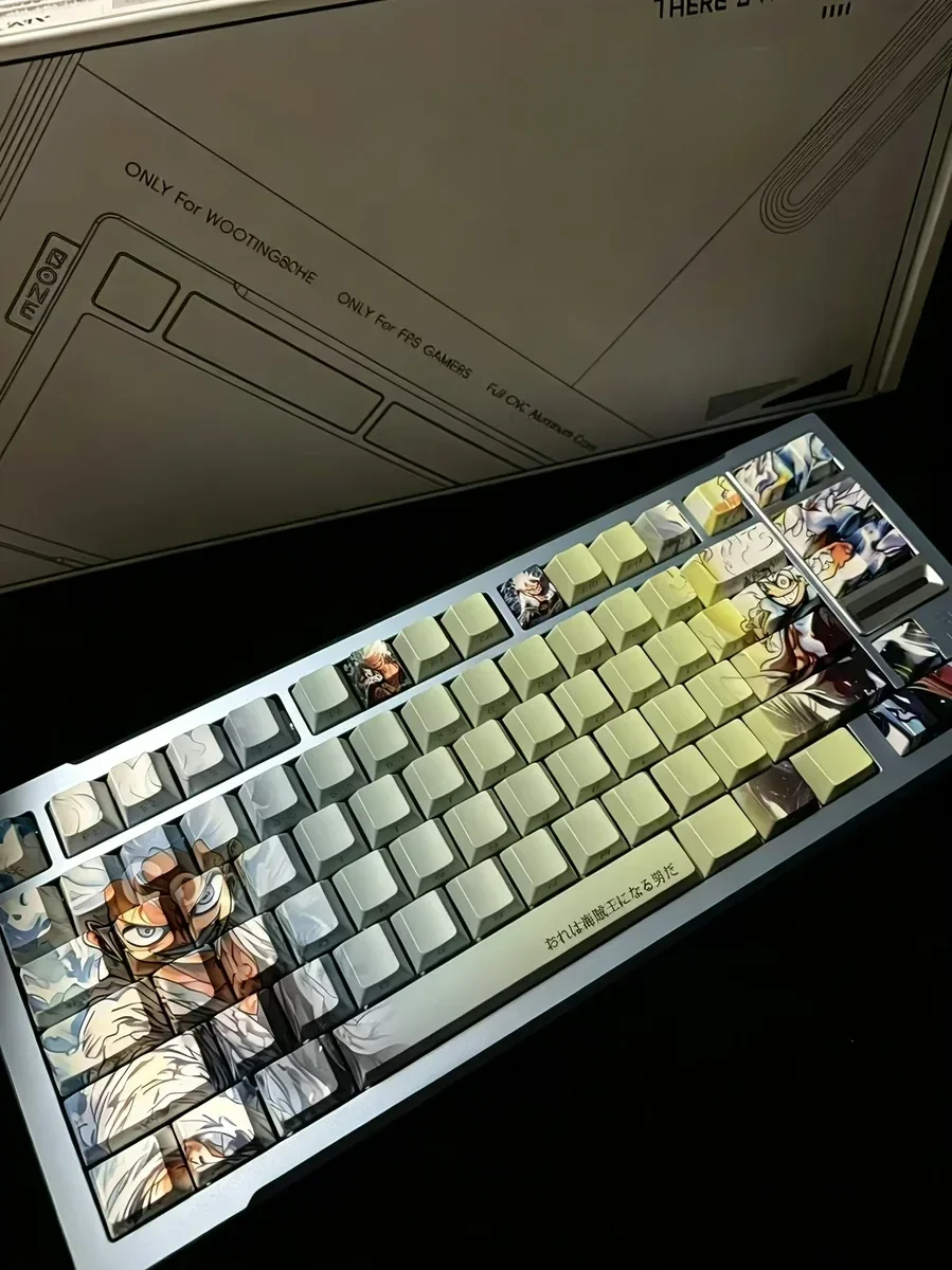 Playful Luffy PBT keycaps set featuring dynamic One Piece art, side-engraved legends, and light-transmitting design for an epic keyboard experience.