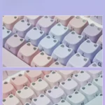 Luminous Cat Keycap Set in multiple views, showcasing its unique luminous cat and water lily design. Serene PBT, with soft hues, highlights design.