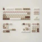 Caramel Maillard PBT dye-sub keycap set, showcasing rich caramel tones from various angles. Durable, premium Cherry profile.