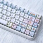 Close-up of charming Maltese Dog Keycaps Set with adorable minimalist line art, showcasing their durable PBT dye-sub material and backlit details.