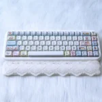Charming Maltese Dog Keycaps Set featuring adorable minimalist line art, showcasing durable PBT dye-sub construction with backlit compatibility. Playful design.