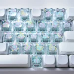 Artistic MAO Keycap Set gallery: transparent PC with elegant line art butterflies and hearts. Unique MAO profile keycaps viewed from multiple angles.