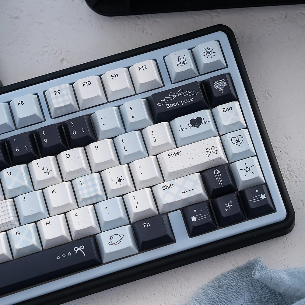 Durable Mercury Blue & Pink Cherry Keycap Set. Ethereal blue-pink cosmic vistas showcase its artistic celestial design.