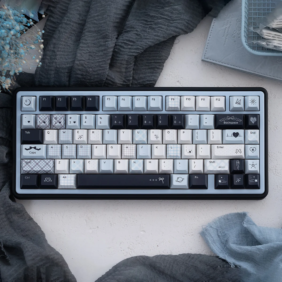 Mercury Blue & Pink Cherry Keycap Set, highlighting its durable PBT and artistic cosmic design with ethereal blues and pinks.