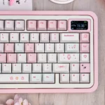 Charming Pixel Miffy PBT keycaps, vibrant pink pixel art Miffy design, displayed from various angles. This playful set adds nostalgic appeal to keyboard.