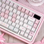 Charming Pixel Miffy PBT keycaps presented from multiple playful angles, highlighting the vibrant pink pixel art Miffy design.