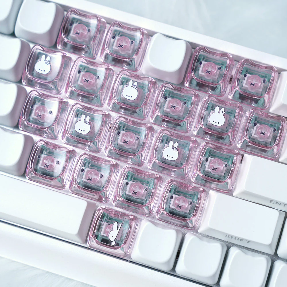 Whimsical Miffy & Friends translucent MAO supplement keycaps set featuring playful heart designs, glowing from multiple angles on a custom keyboard.