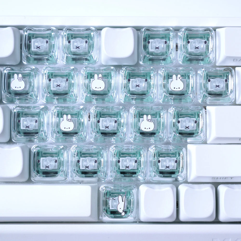 Charming Miffy & Friends translucent MAO supplement keycaps set, featuring whimsical Miffy and heart designs glowing playfully from various perspectives.