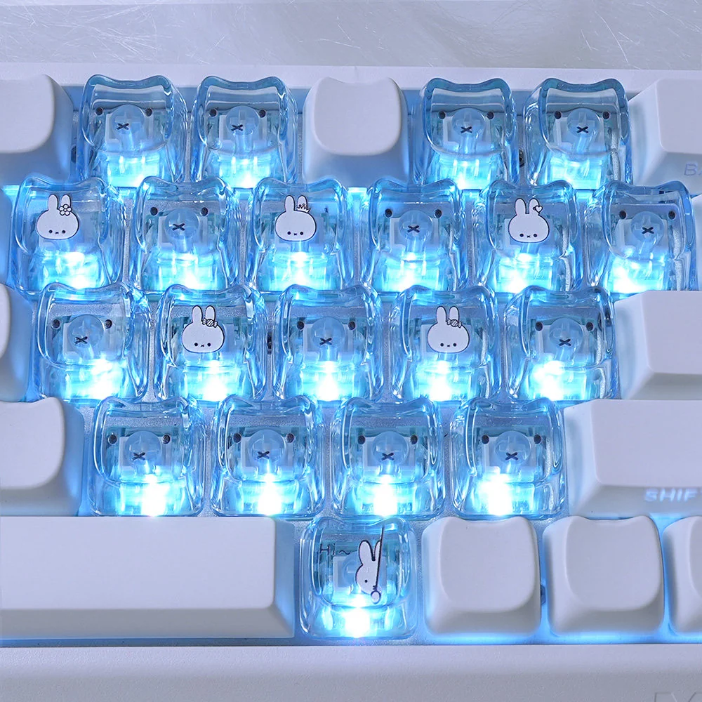 Whimsical Miffy & Friends translucent MAO supplement keycaps set featuring glowing Miffy and heart designs from a playful angle, enhancing any keyboard.
