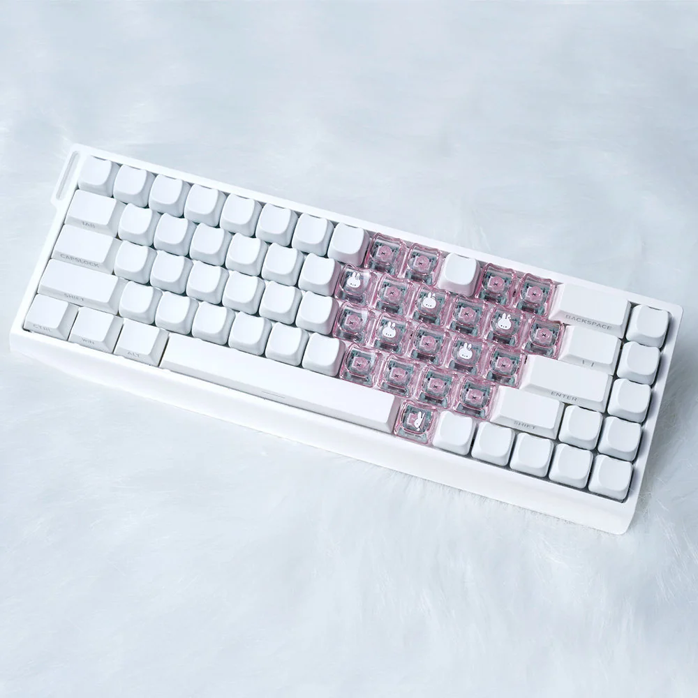 Playful Miffy & Friends translucent MAO supplement keycaps set, showcasing whimsical Miffy and heart designs glowing from multiple charming perspectives.