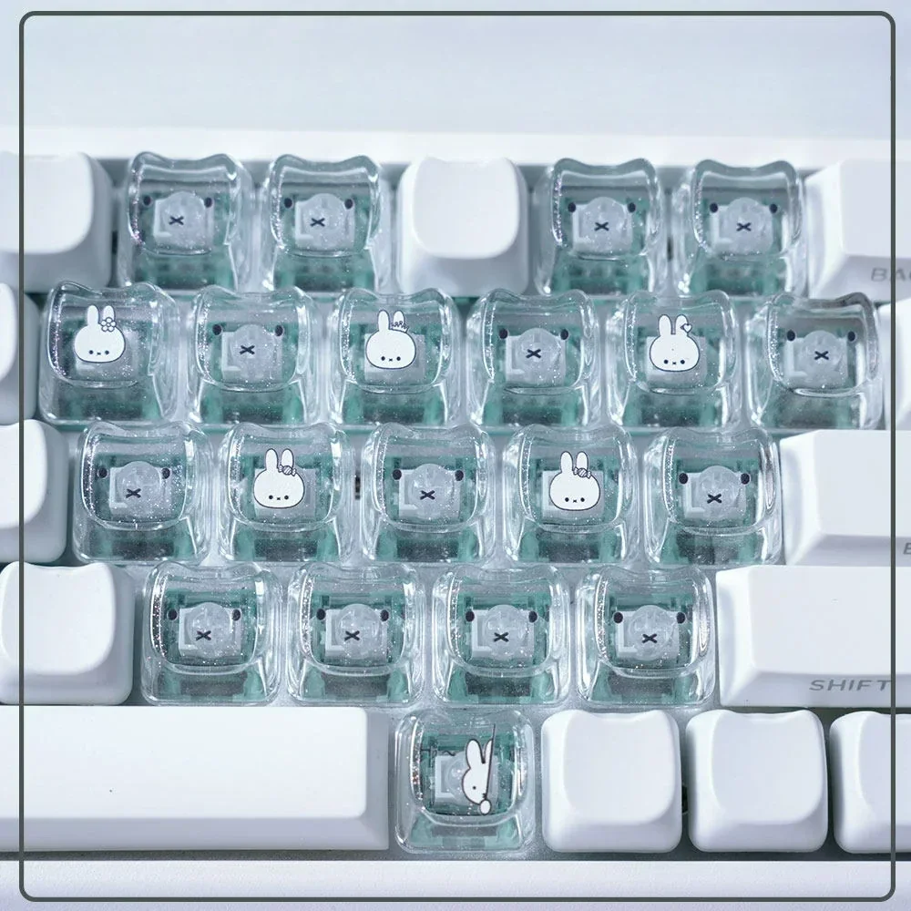 Playful Miffy & Friends translucent glitter MAO supplement keycaps set, featuring whimsical Miffy rabbit designs that glow. Perfect for a charming keyboard.