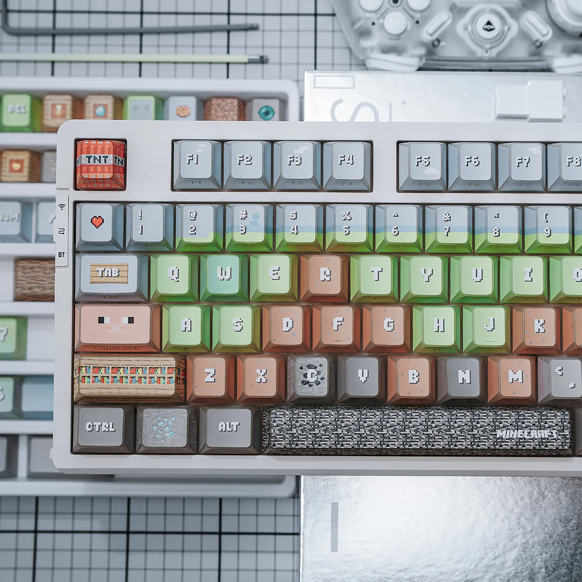 A close-up view of the durable PBT Minecraft keycaps set from a new angle, showcasing their vibrant pixelated design and block-based aesthetic, perfect for fans.