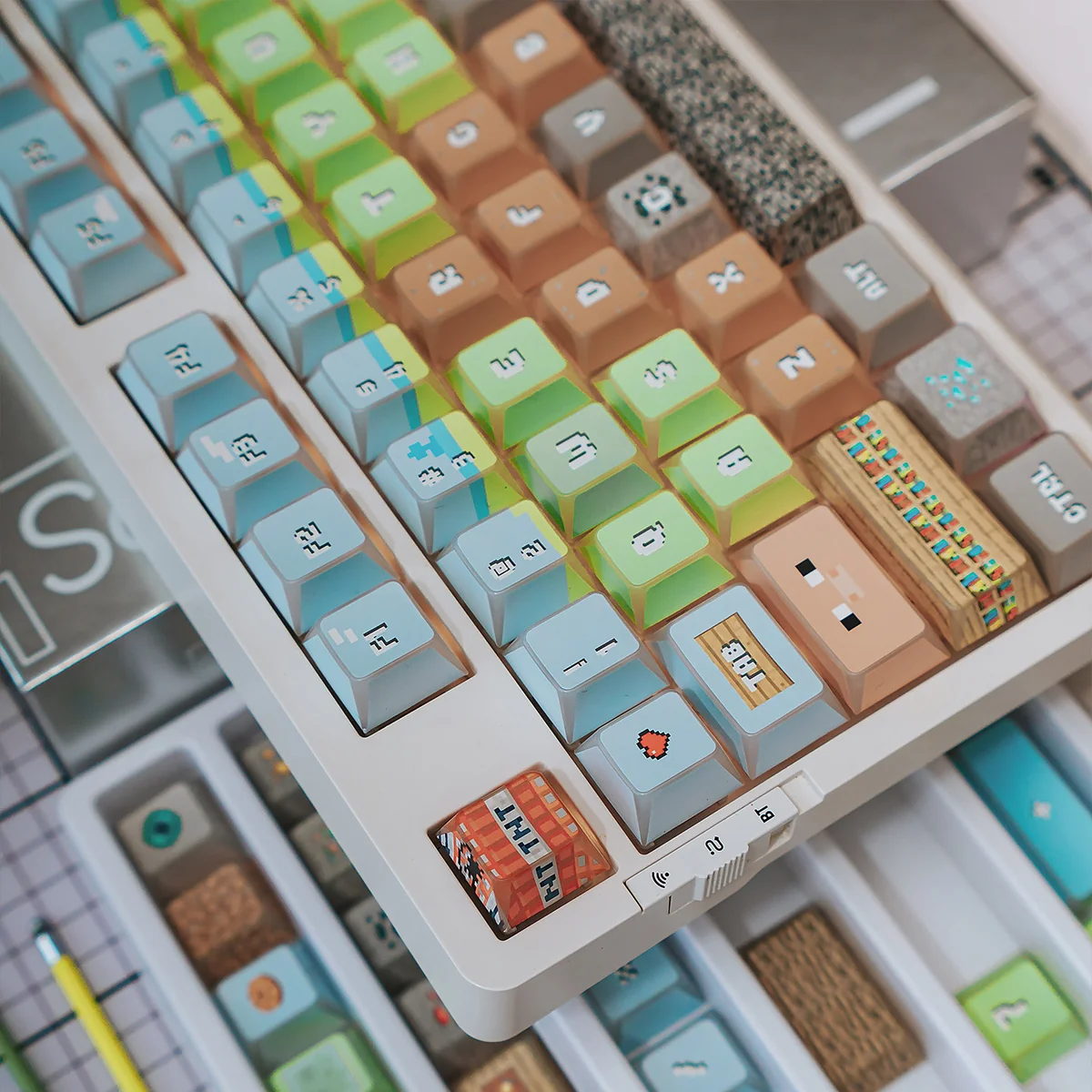 Detailed side view of durable PBT Minecraft keycaps set, highlighting their angular, pixelated design and vibrant block-based aesthetic, adding playful feel.