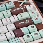 Premium PBT dye-sub Mint Chocolate Keycaps Set (SOA profile) showcasing mint green and chocolate brown. A sweet, whimsical dessert theme for your keyboard.